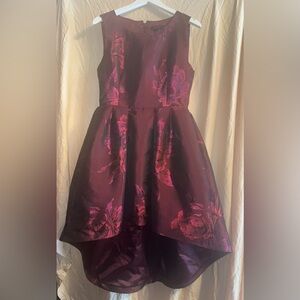 Chic High-Low Dress in Deep Burgundy with Iridescent Floral Design